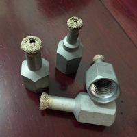 Vacuum brazed diamond core drill bit for stone