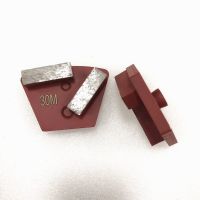 Diamond traps shape concrete disc for STI grinder